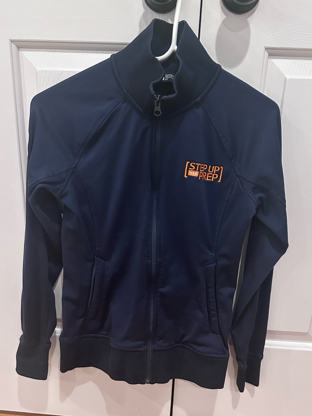 The North Face Navy Zip-Up Jacket with Orange Logo